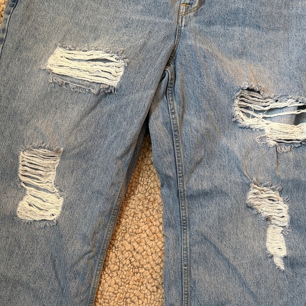 Good American Ripped Ankle Jeans in Light Blue - Picture 4 of 10